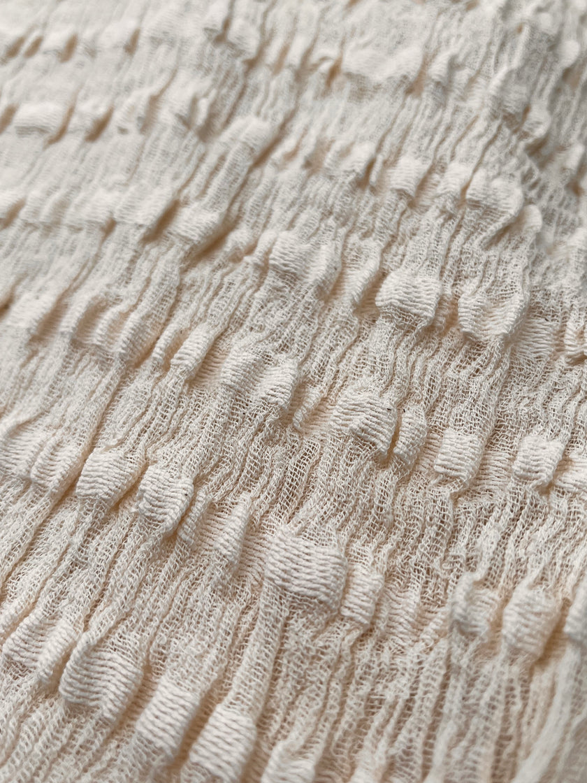 Neutral Textured Cotton Stretchy Crinkle Fabric.