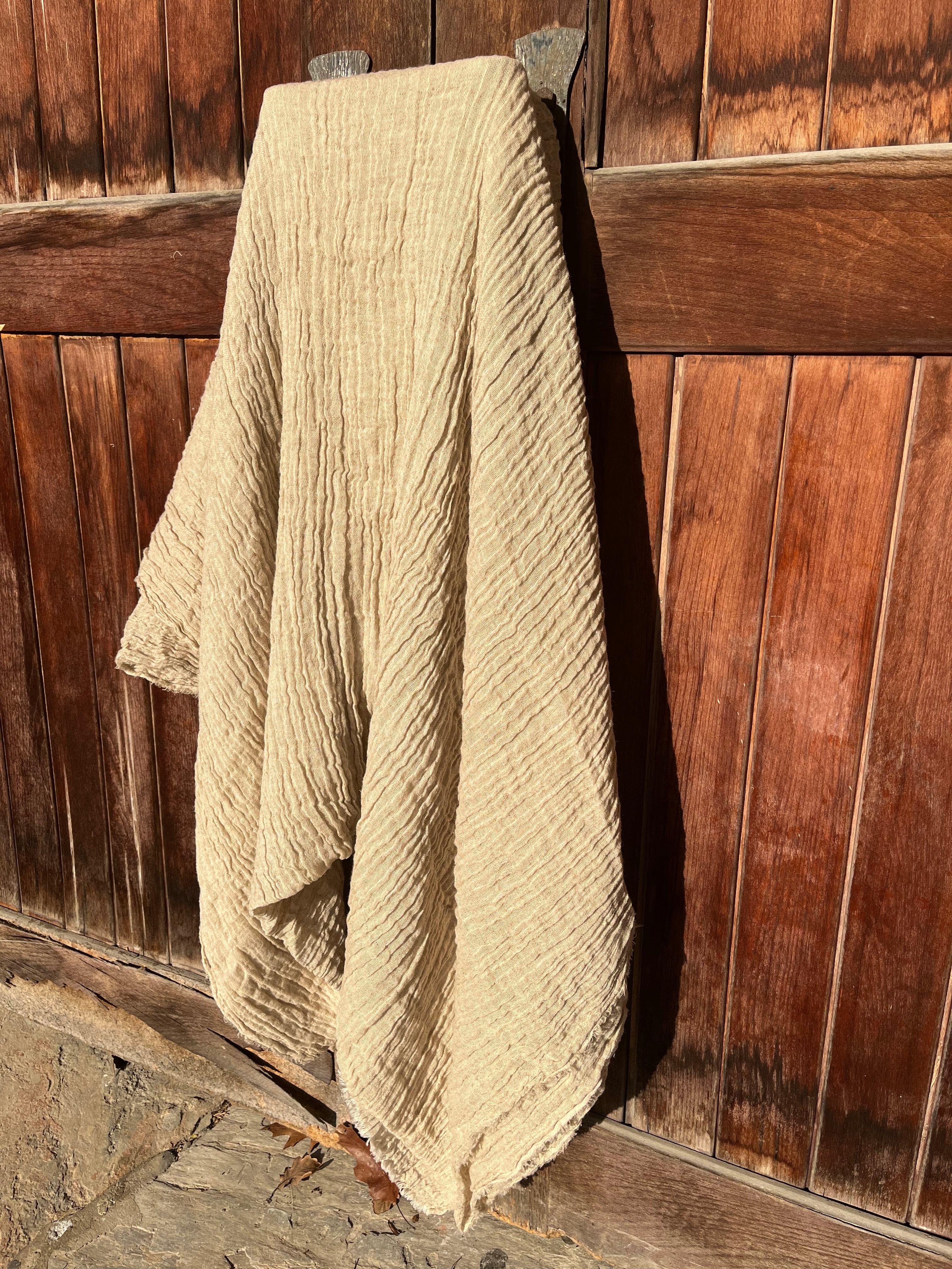 Neutral Stretchy Crinkle Linen Fabric, Textured Surface.