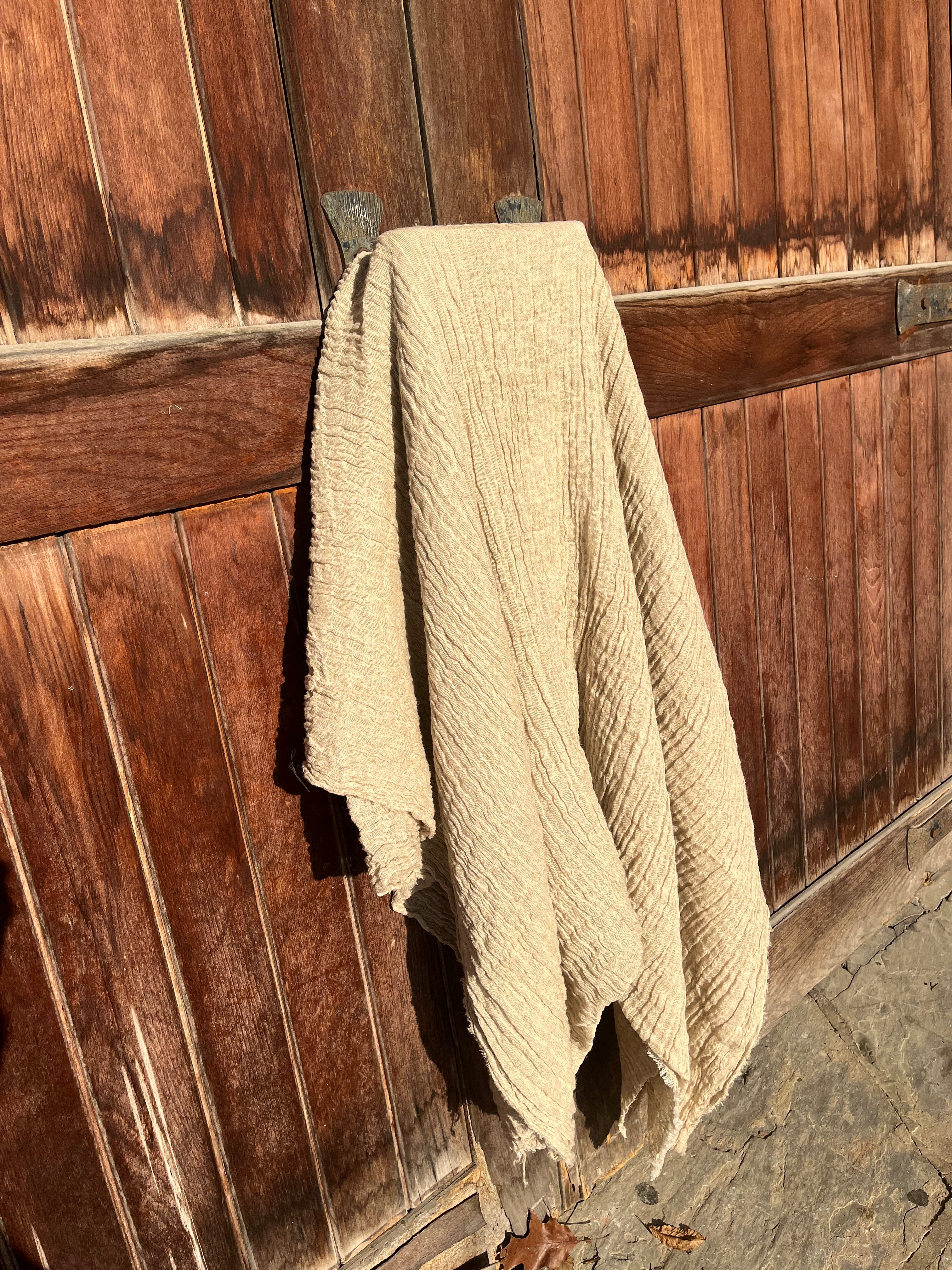 Neutral Stretchy Crinkle Linen Fabric, Textured Surface.