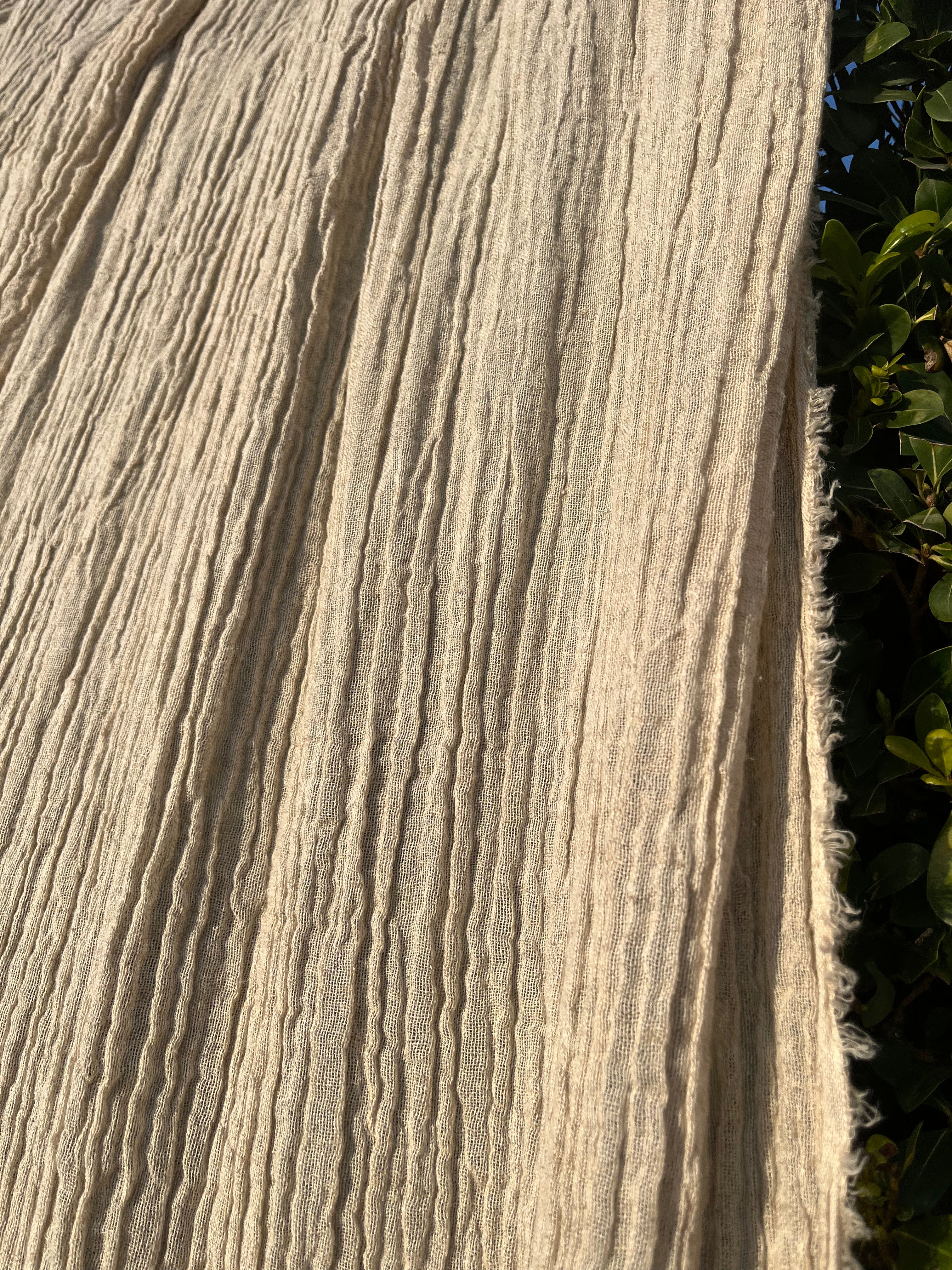Neutral Stretchy Crinkle Linen Fabric, Textured Surface.