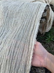 Neutral Stretchy Crinkle Linen Fabric, Textured Surface.