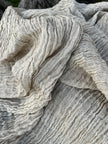 Neutral Stretchy Crinkle Linen Fabric, Textured Surface.