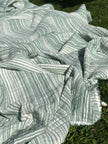 Muslin Fabric Green-Pink Shades Pin Stripes With Glitter.