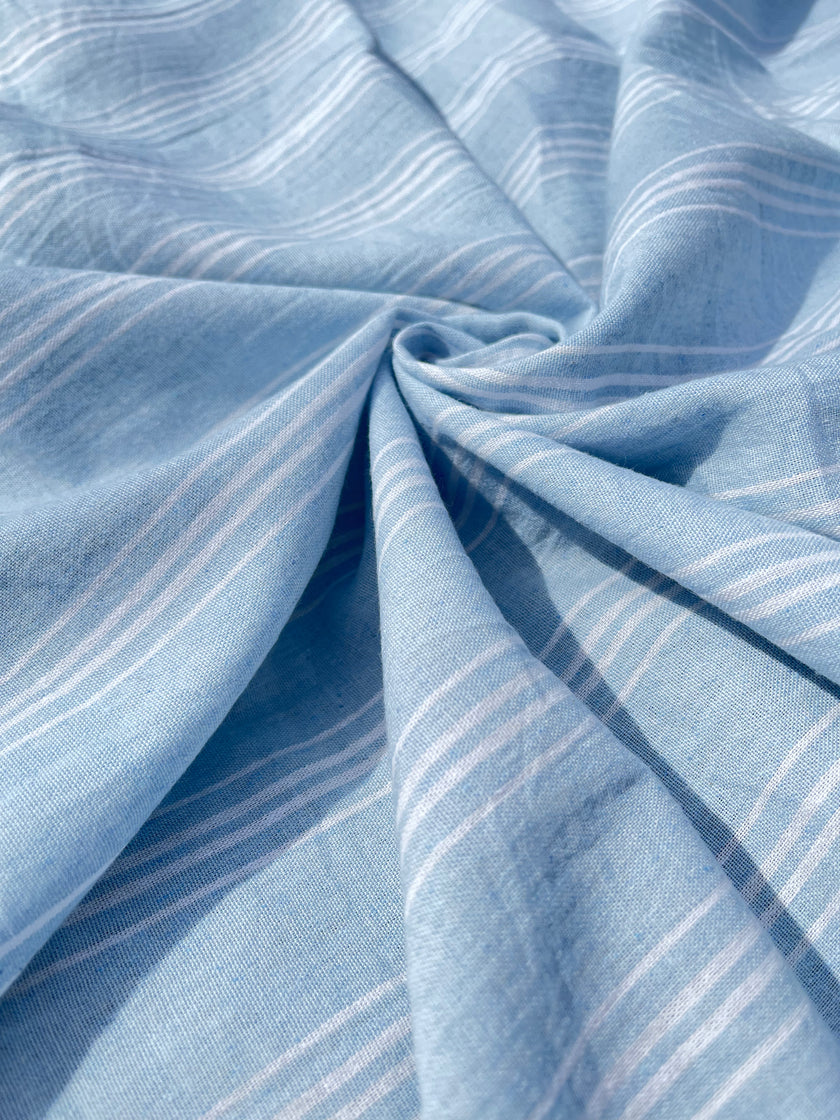 Cotton Light Weight Blue Yarn Dyed Fabric With Pin Stripes.