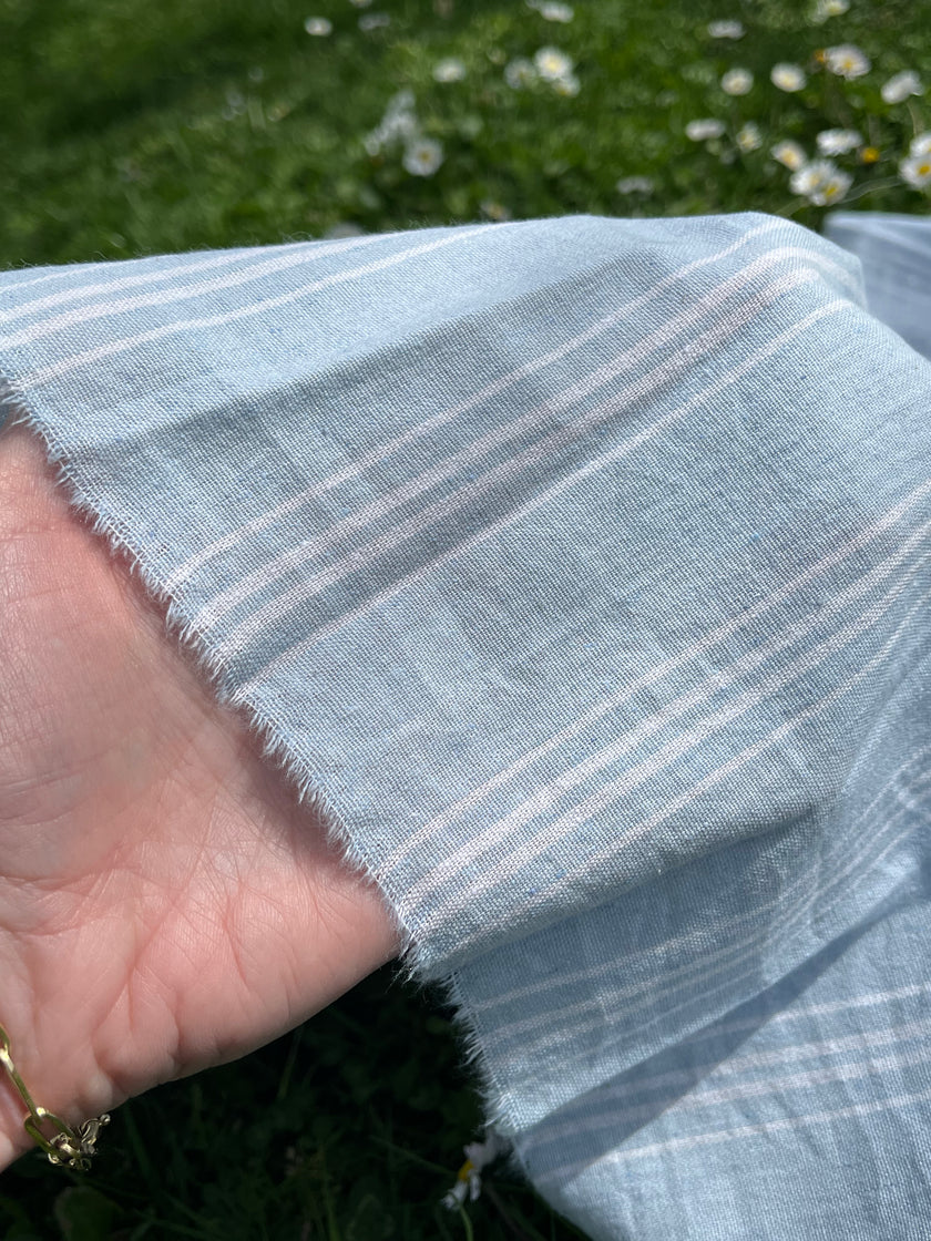 Cotton Light Weight Blue Yarn Dyed Fabric With Pin Stripes.