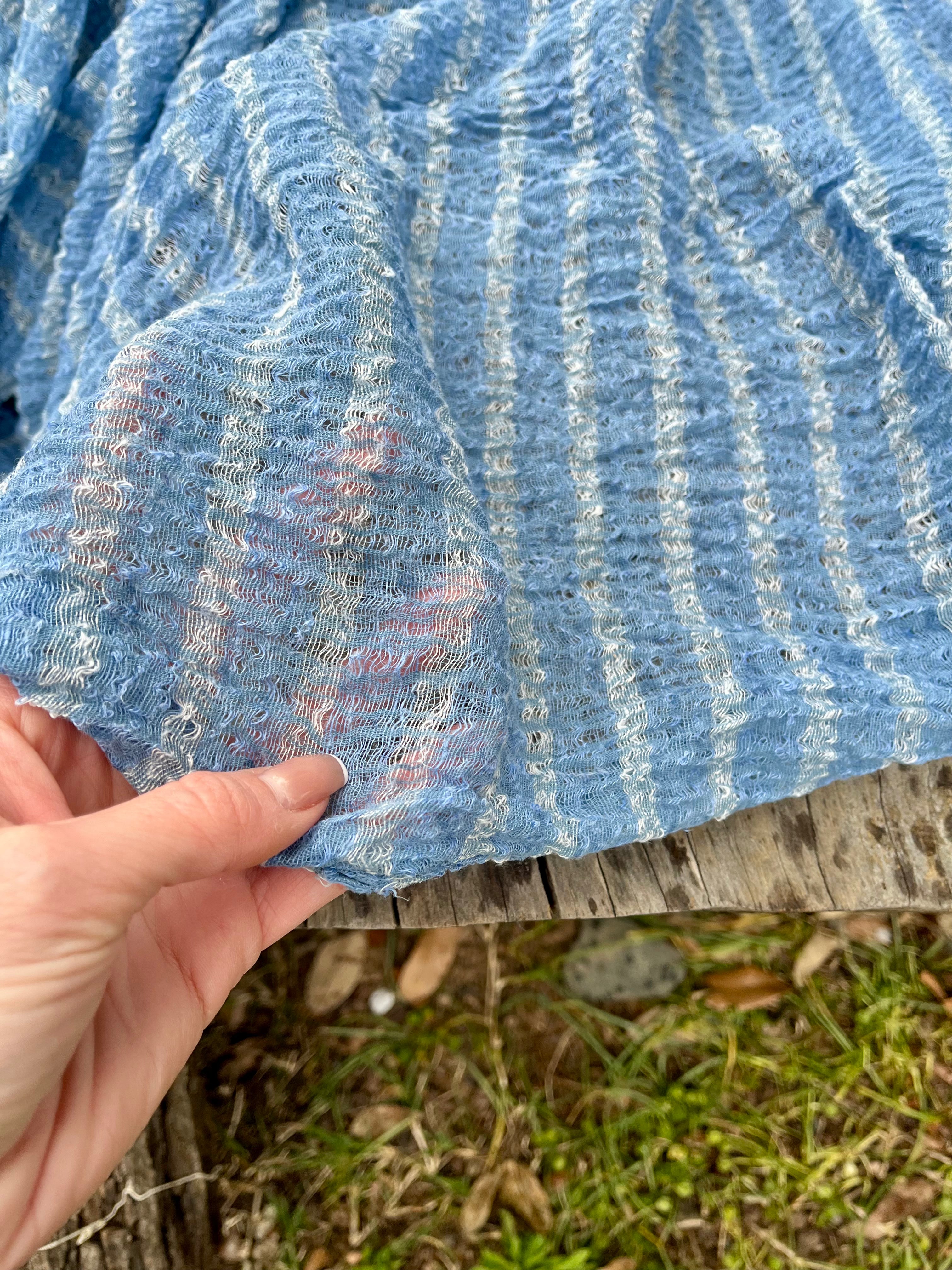 Indigo Blue Textured Sheer Linen Fabric With White Stripes.