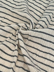 Tissu de gaze froissé de couleur ivoire neutre non blanchi, tissu Sile. Tissu Sile.