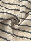 Tissu de gaze froissé de couleur ivoire neutre non blanchi, tissu Sile. Tissu Sile.