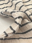Tissu de gaze froissé de couleur ivoire neutre non blanchi, tissu Sile. Tissu Sile.
