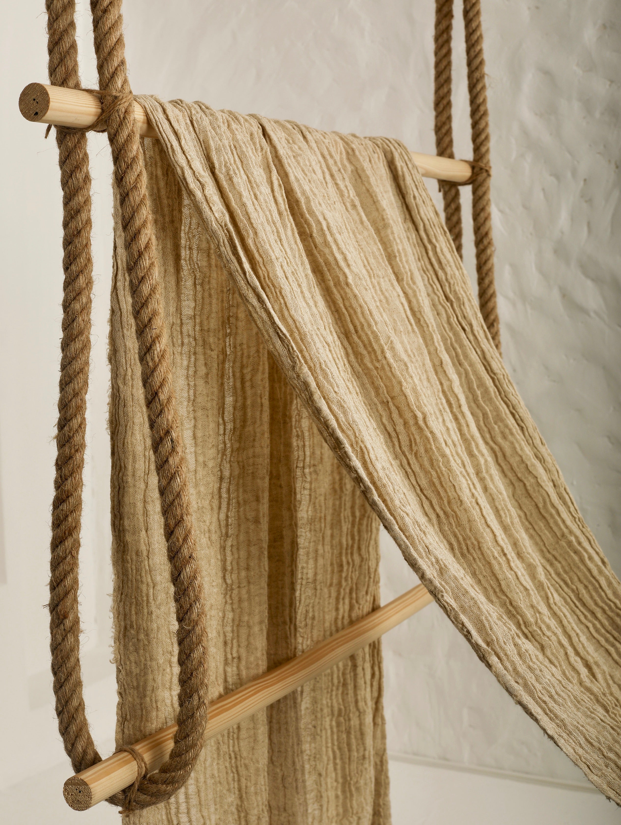 Neutral Stretchy Crinkle Linen Fabric, Textured Surface.