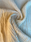 Tissu en coton froissé extensible neutre, surface texturée, coton tissé à la main blanc cassé, tissus semi-transparents, non blanchis et tissés à la main biologiques.